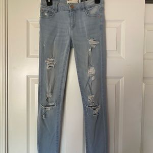 light wash jeans with rips